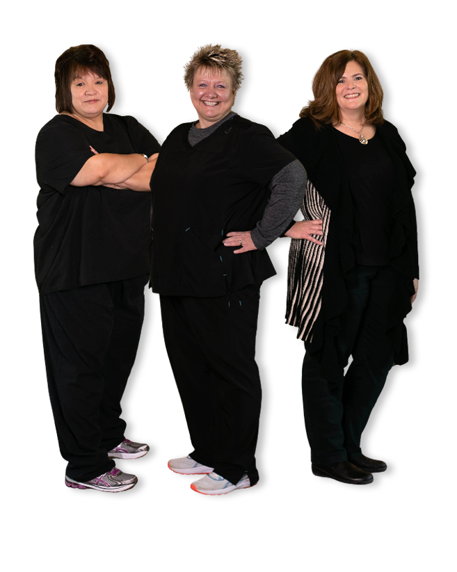 Three women smiling