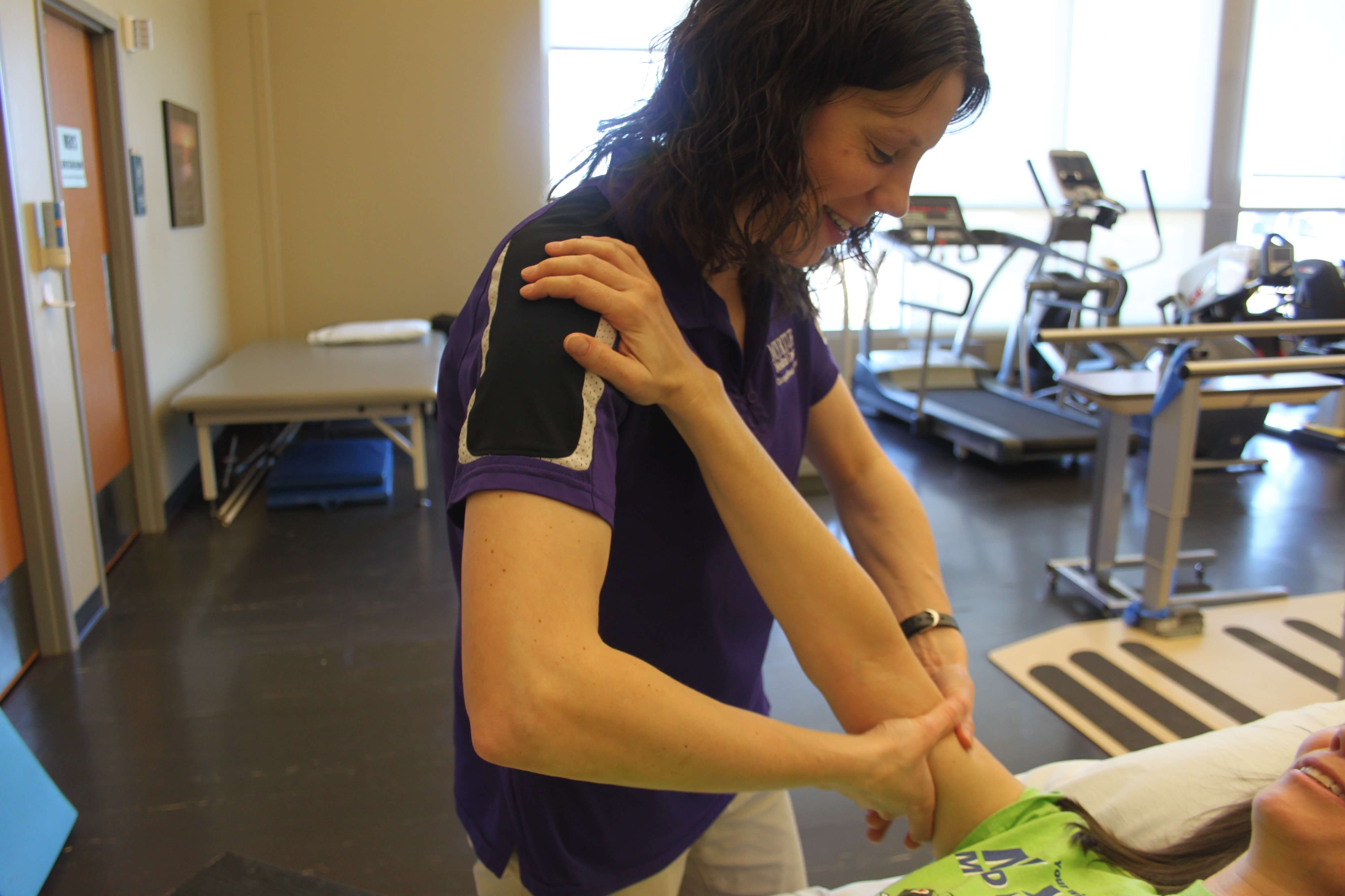 Woman performing physical therapy