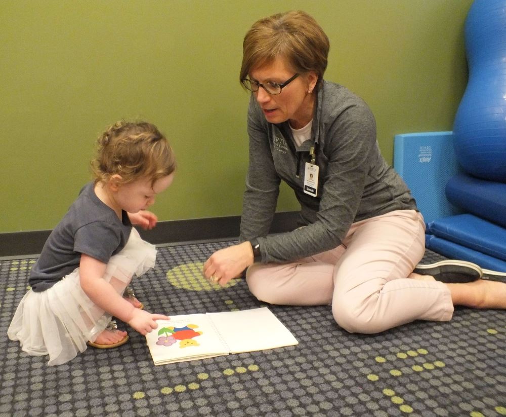 Woman teaching the child